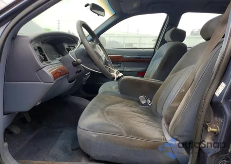 1997 Mercury Grand Marquis Gs z USA, uszkodzony, nr VIN 2MELM74W5VX693051